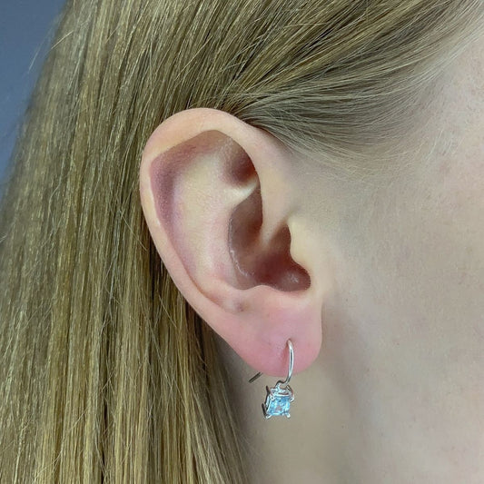 Pendientes de topacio azul en plata de ley