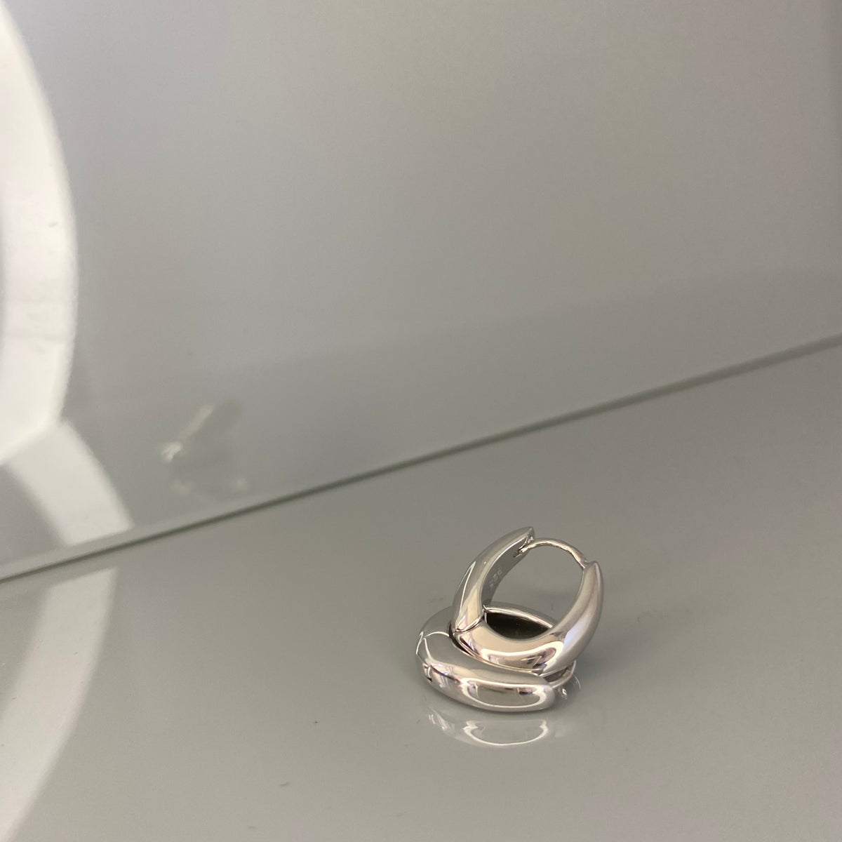 Aros ovalados de plata de ley