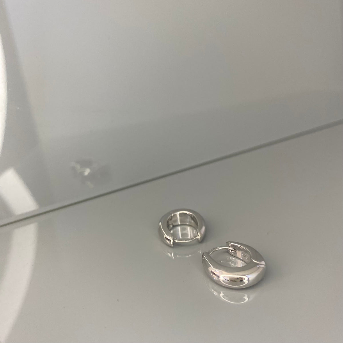 Aros ovalados de plata de ley