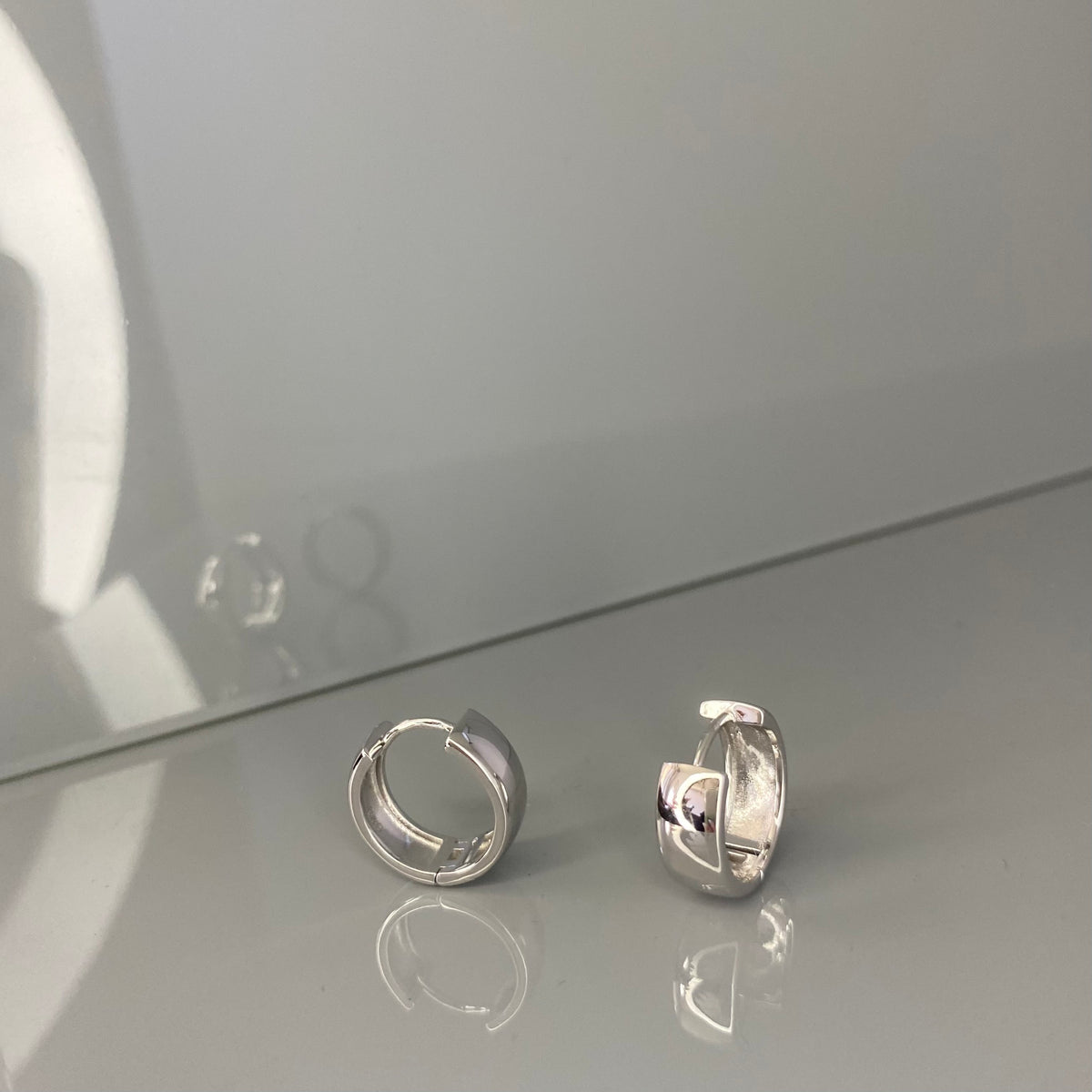 Aros anchos de plata de ley