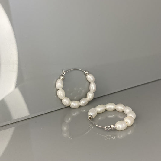 Pendientes de margarita de plata de ley