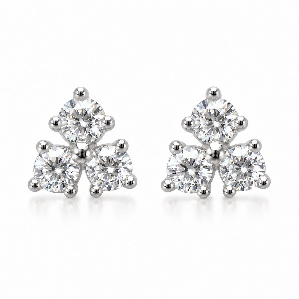 Aretes de plata esterlina con tres circonitas cúbicas
