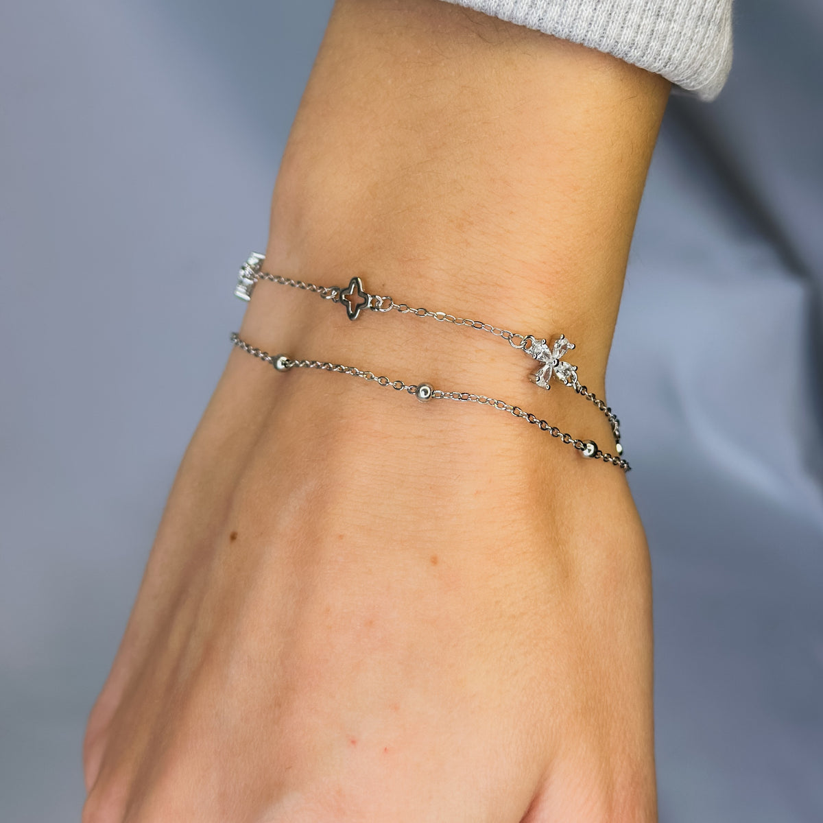 Pulsera de plata de ley con trébol y flor