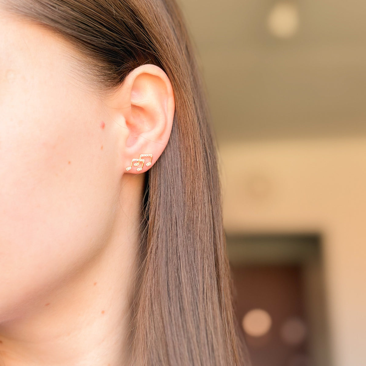 Pendientes de plata de ley con notas musicales