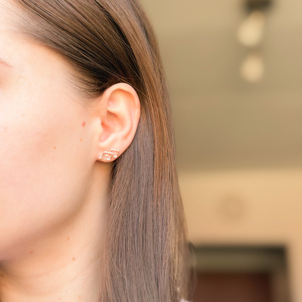 Pendientes de plata de ley con notas musicales