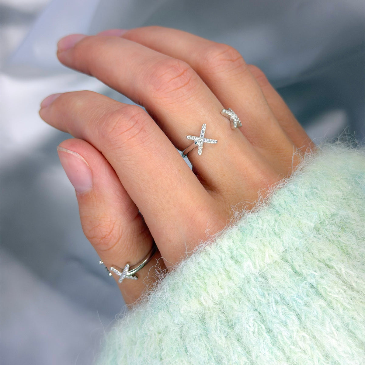 Anillo en X de plata esterlina
