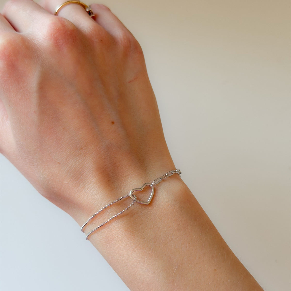 Pulsera de plata de ley con doble cadena y corazón